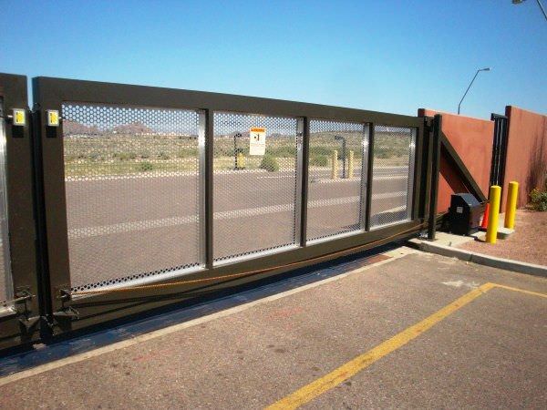 PERFORATED ALUMINUM MONORAIL GATE AT EAST VALLEY BUS OPERATIONS 014